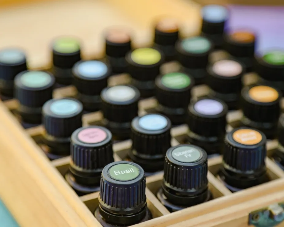 image of a case with bottles of essential oils in including basil