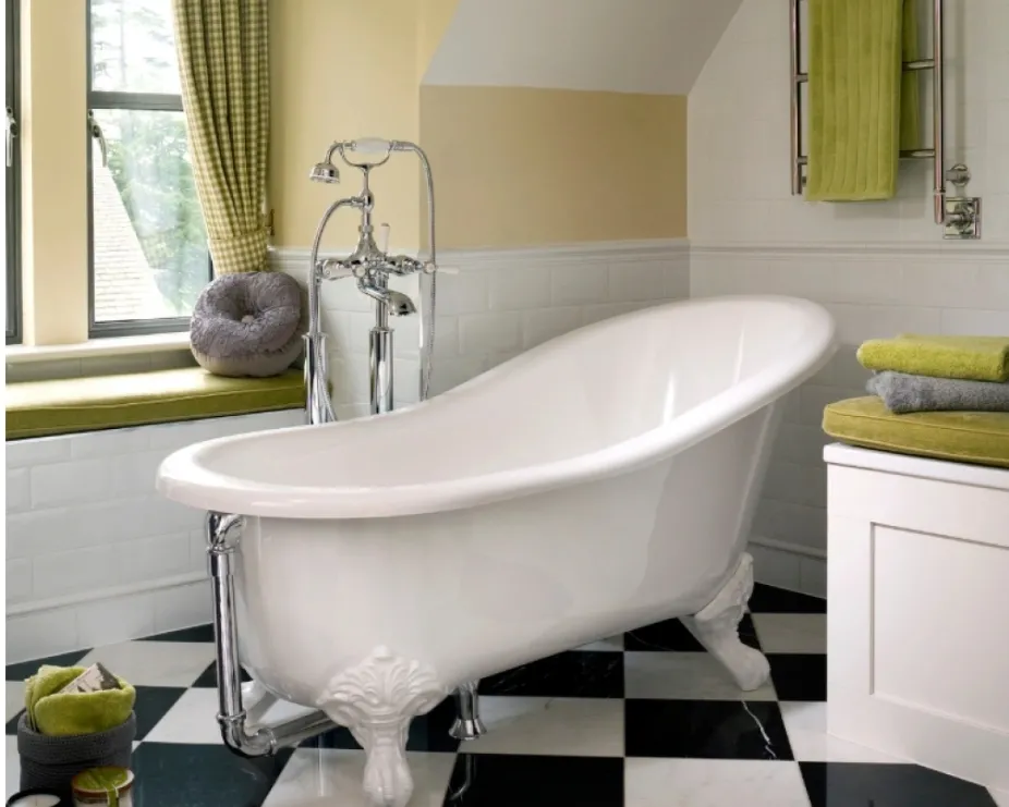 image of a freestanding bath with bright green coloured walls, towels and furnishing, along with chequerboard floor