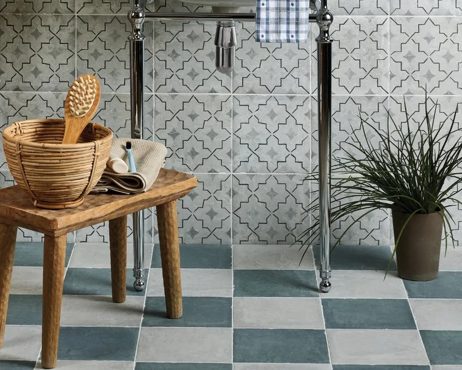 image of a bathroom with a chequerboard floor and chrome washstand