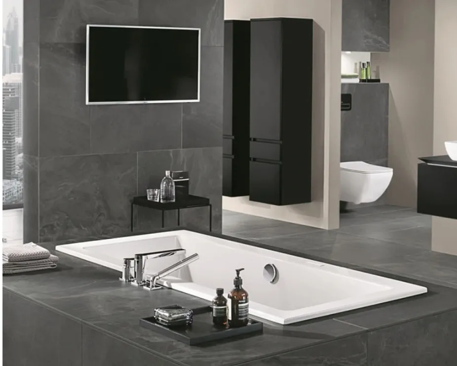 image of villeroy and boch legato bath sunken into floor in grey tiled bathroom