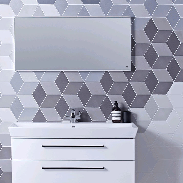 Lifestyle image of a bathroom with lilac geometric wall tiles