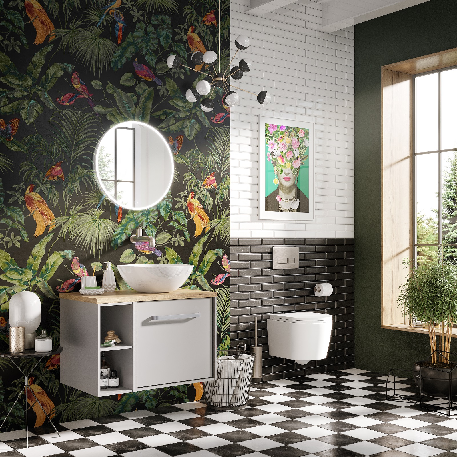 Lifestyle image of a black and white bathroom design, with chequerboard floors, contrasting black and white wall tiles, white washbasin unit and a tropical wallpaper with a black backdrop