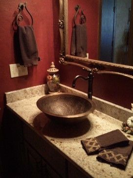 Lifestyle image of a Tuscan brown bathroom with a copper countertop basin