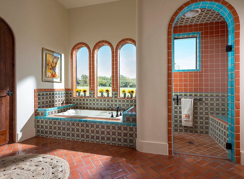 Lifestyle image of a brown tiled bathroom with white walls