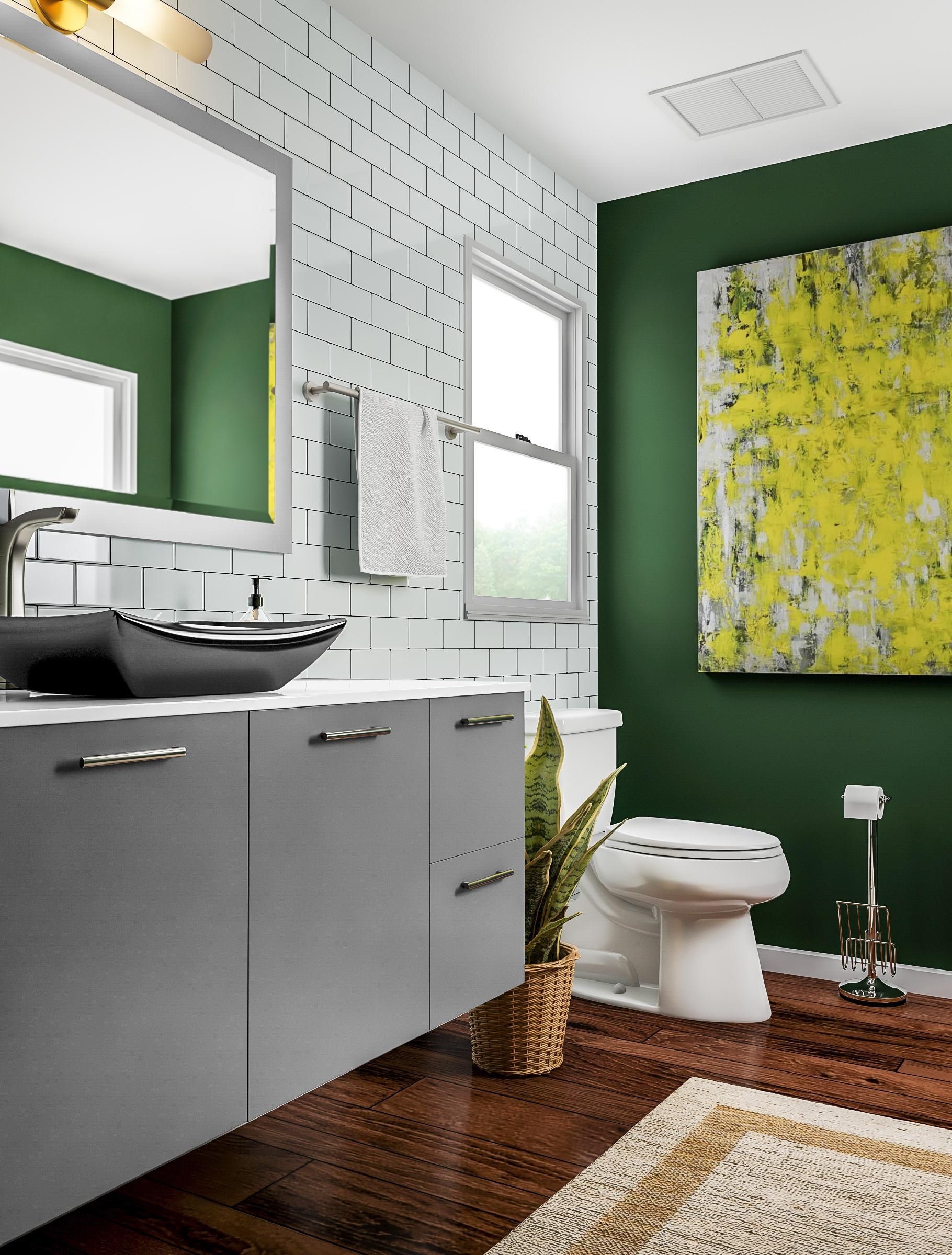 image of dark wood floor bathroom with green feature wall, white metro tiled wall with wall hung grey 4 door vanity unit and stylish countertop basin, close coupled toilet and spiky plant in wicker pot
