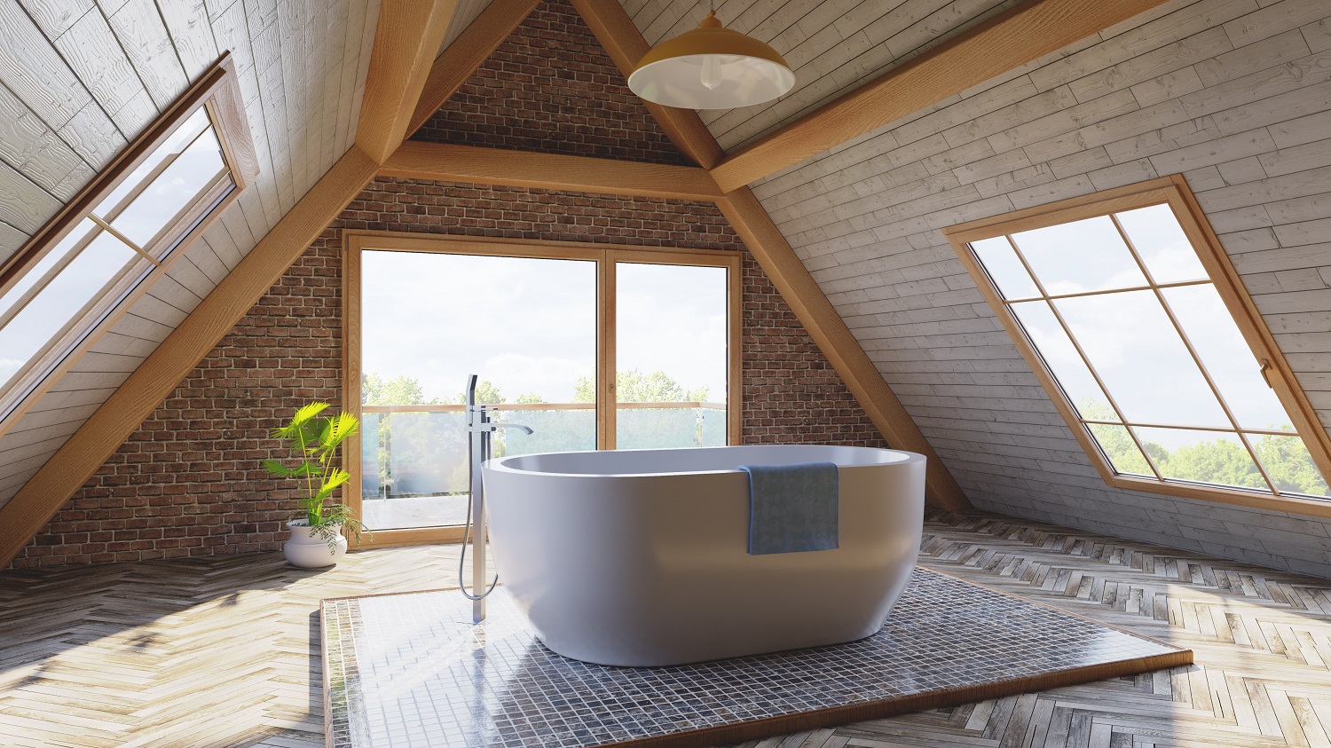 Digital lifestyle image of a large attic bathroom, with wooden floorboards in a chevron pattern, a raised tile platform, a freestanding bath with floorstanding tap and handset shower, large french windows and skylights