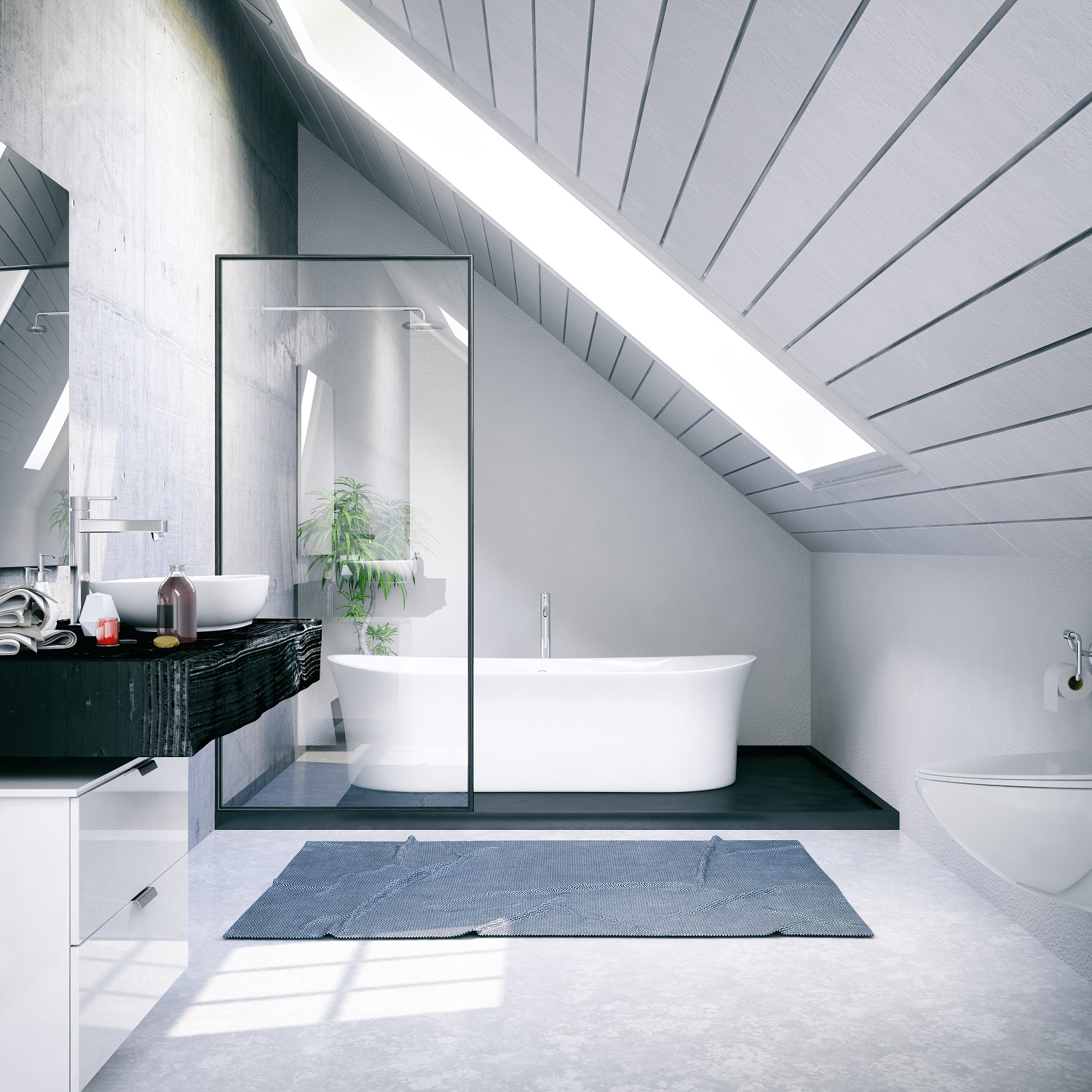Lifestyle image of an attic bathroom with white floors and walls, a raised platform with a freestanding bat and wall mounted showerhead, a white wall mounted vanity unit, painted black wooden countertop, washbasin and wall mounted toilet with concealed cistern