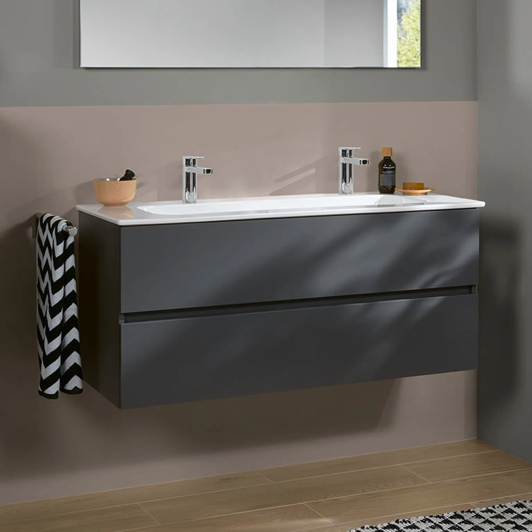image of a large grey vanity unit with trough like basin and chrome taps