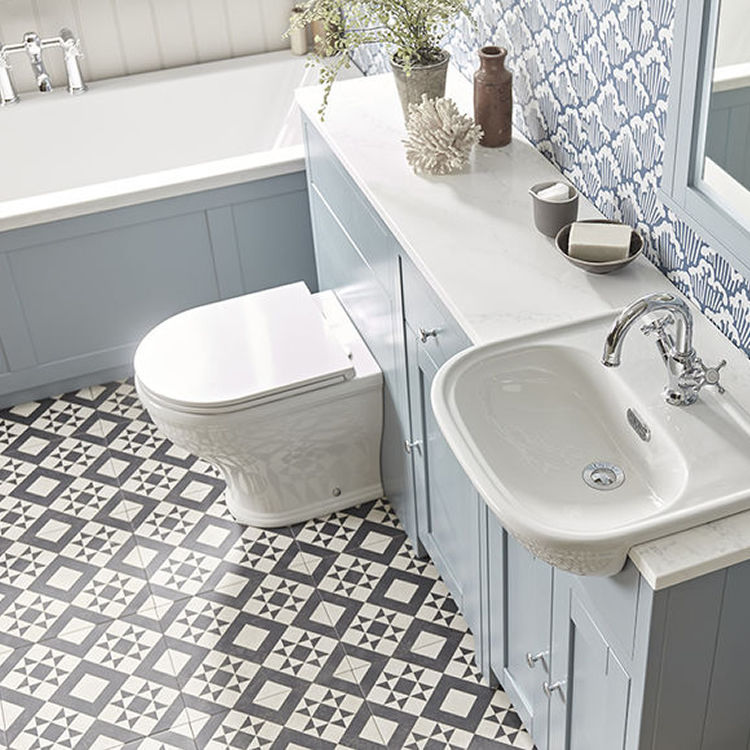 Product Lifestyle image of the Tavistock Lansdown Back To Wall Toilet and Soft Closing Seat