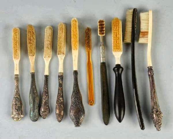 Close up image of a selection of ornate Victoiran toothbrushes
