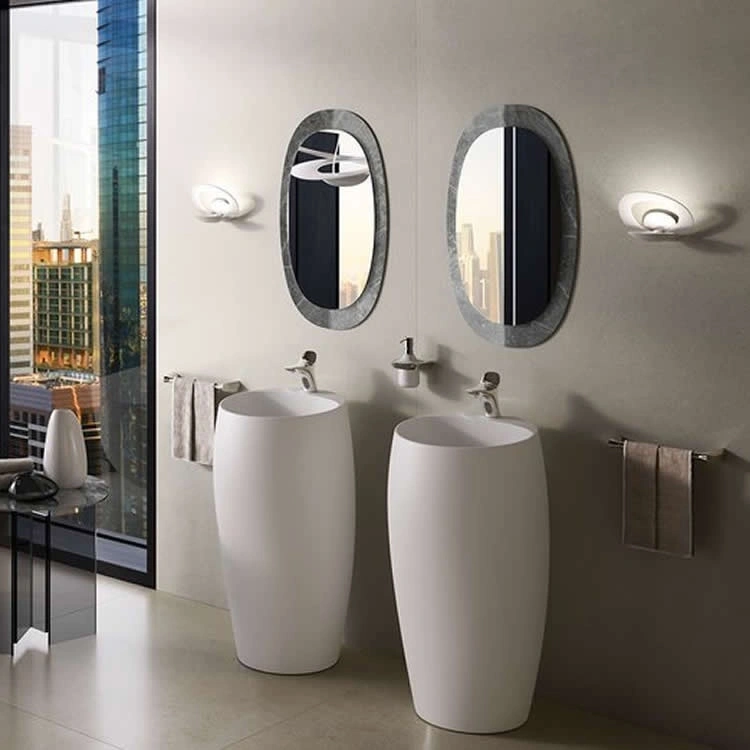 image of two freestanding basins in a barrel shape stood next to each other in a bathroom space