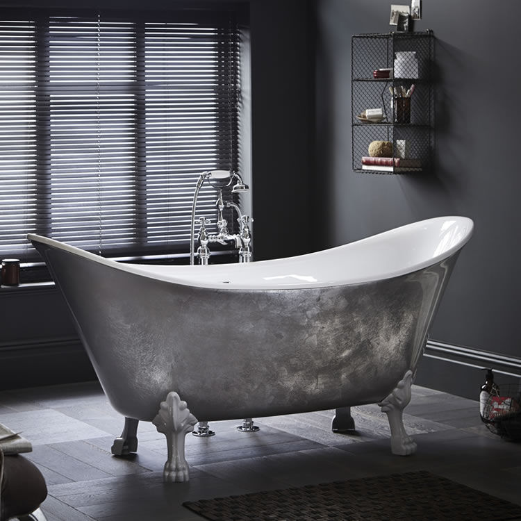 Lifestyle image of an Industrial style open wire frame bathroom shelf mounted next to a freestanding bath