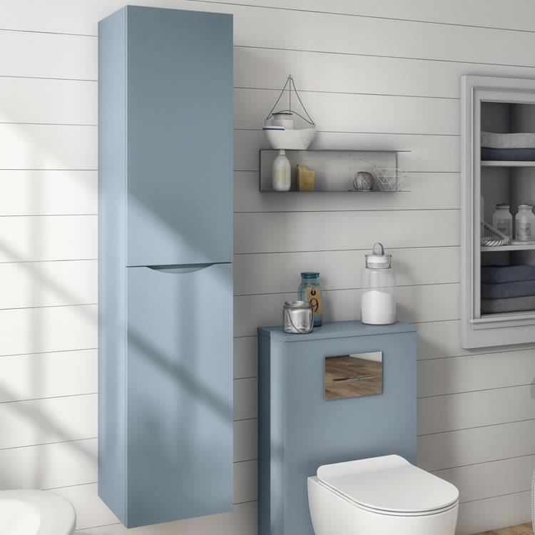 Lifestyle image of a pale blue New England style wall mounted tall bathroom cabinet