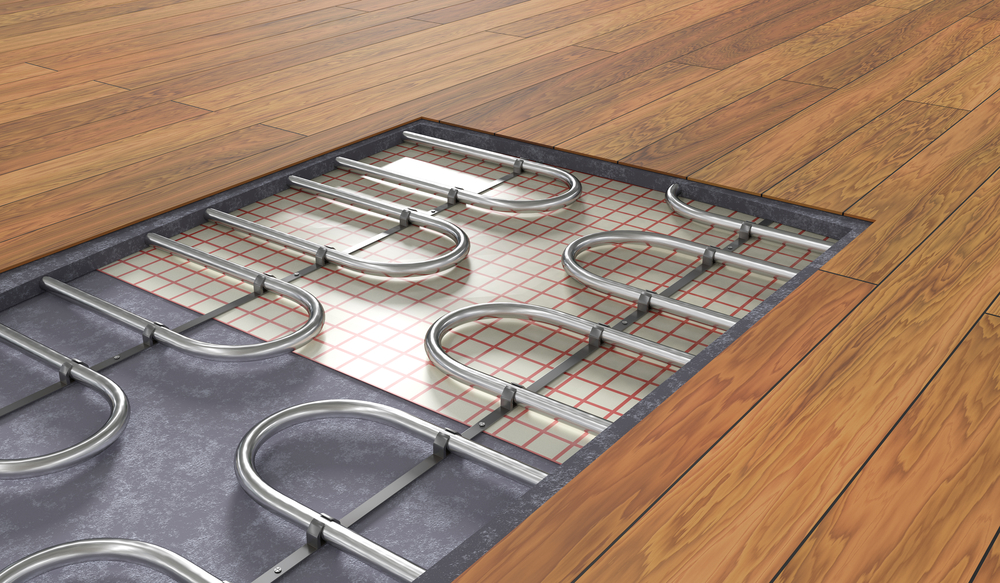 Digital image displaying the inner workings of underfloor heating once it has been installed under floorboards