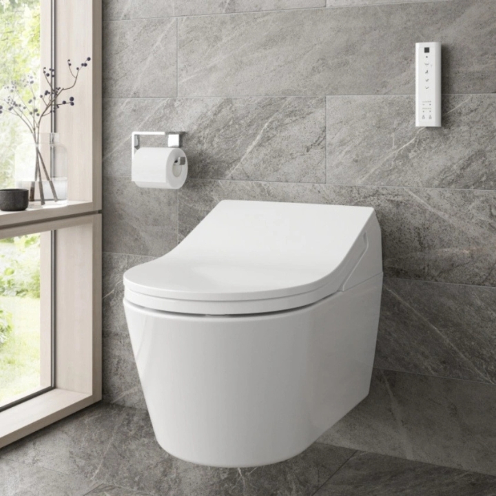 lifestyle image of TOTO Washlet RX Auto Flush Rimless Wall Hung Toilet