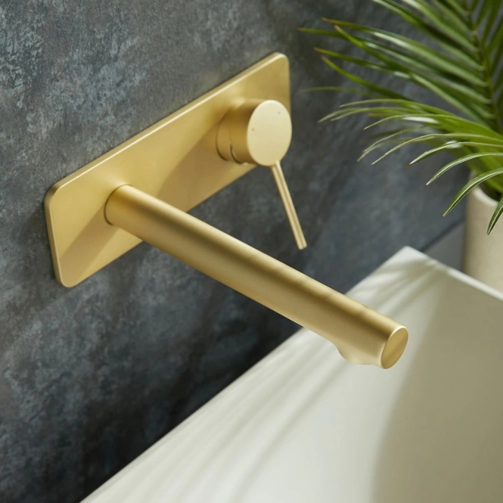 Lifestyle image of Vado Safari Lever Satin Brass 2 Tap Hole Wall Mounted Basin Mixer With Back Plate