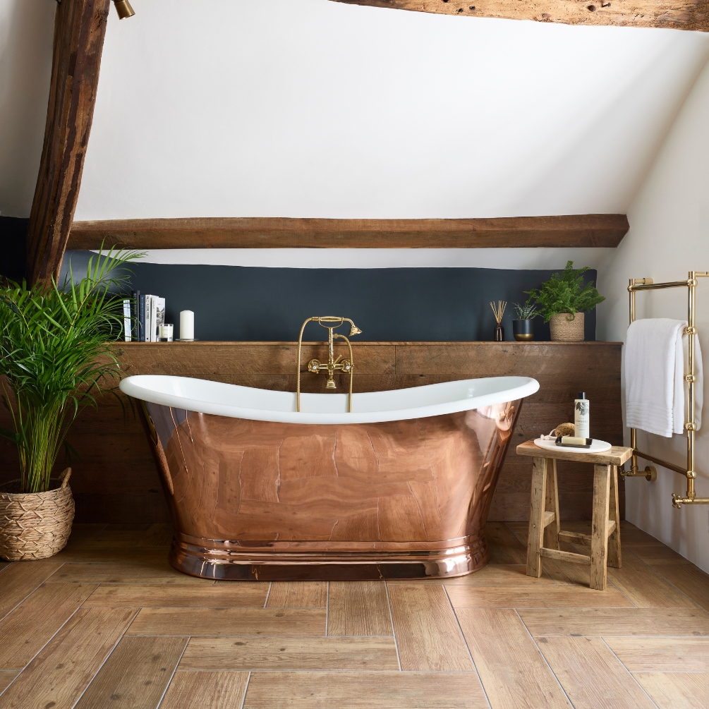 Lifestyle image of the BC Designs Copper Acrylic boat bath in a coastal style bathroom
