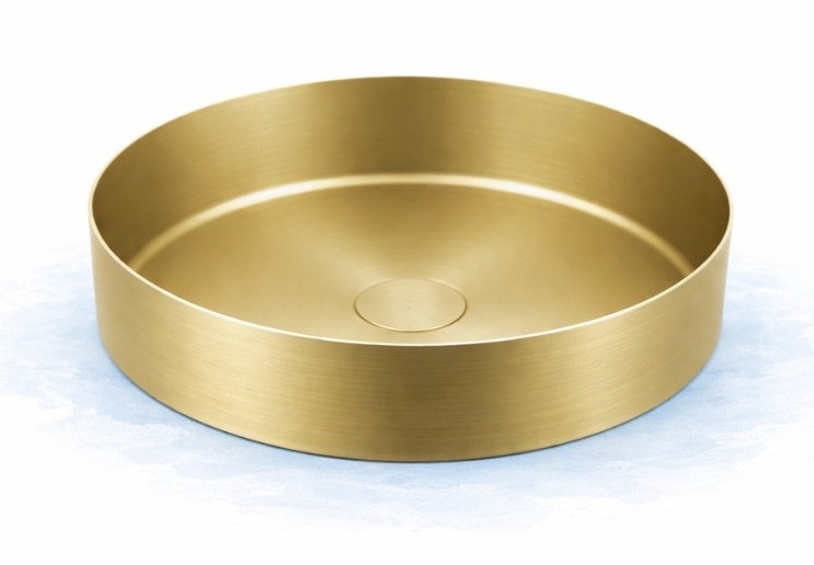 Cut out image of a brushed brass countertop basin