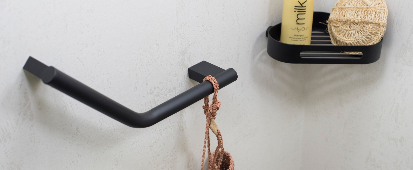 Lifestyle image of the Origins Living Sonia Lux Black Angled Grab Bar