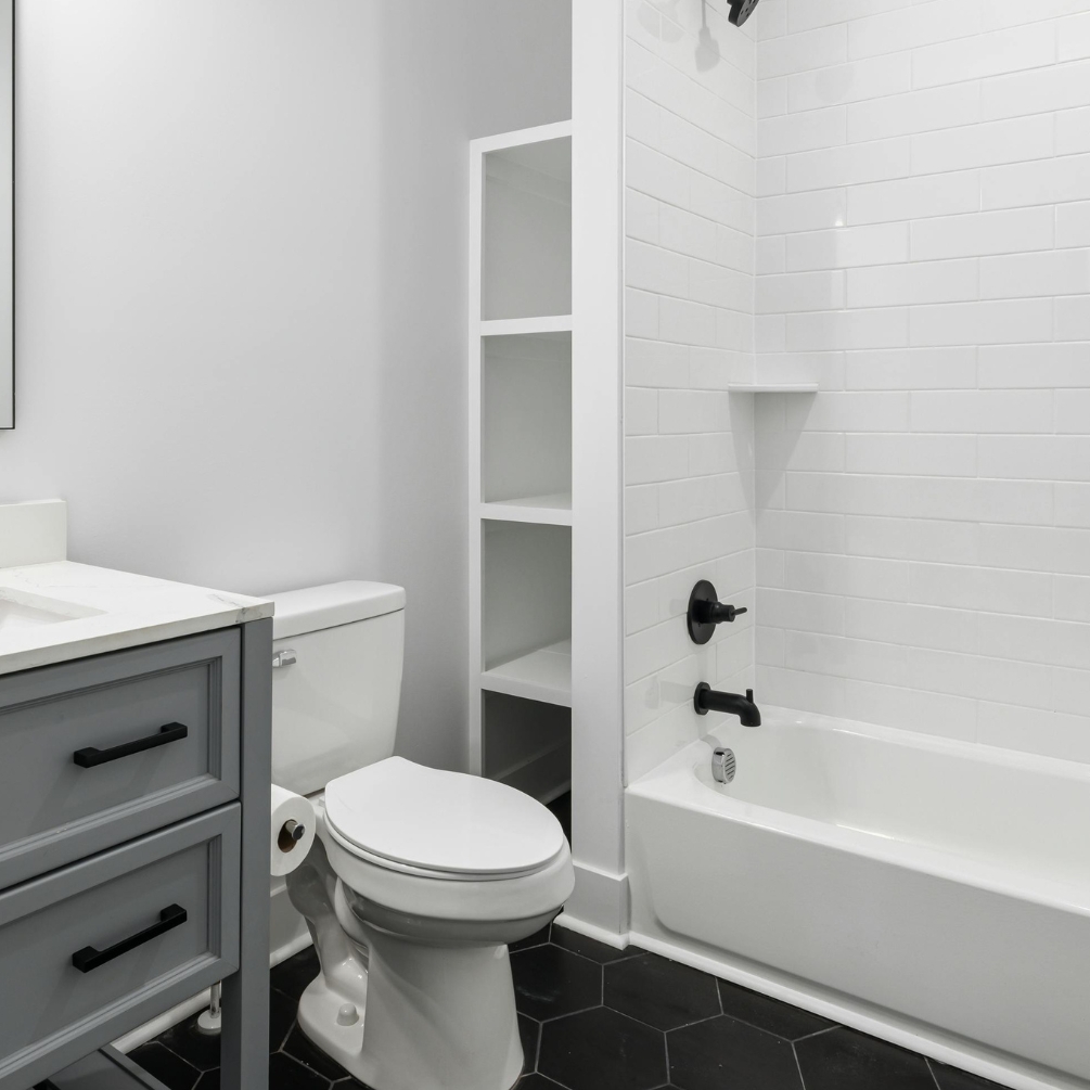 lifestyle image of a recessed bathroom shelf