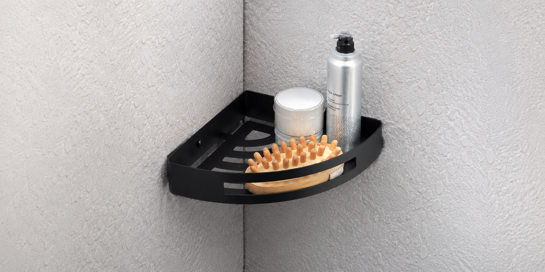 Origins Living Nerva Corner Shower Basket in a shower with bathroom essentials