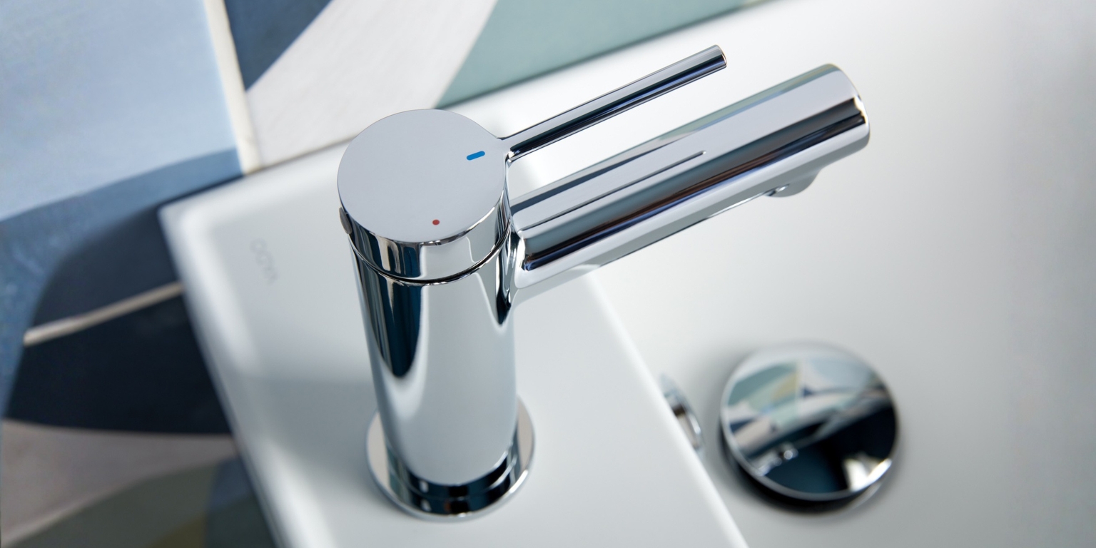 A Vado Safari Lever Mini Chrome Mono Basin Mixer on a cloakroom basin