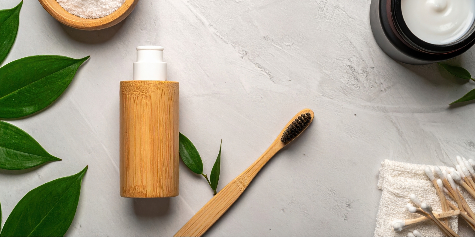 A dispenser and toothbrush made from bamboo