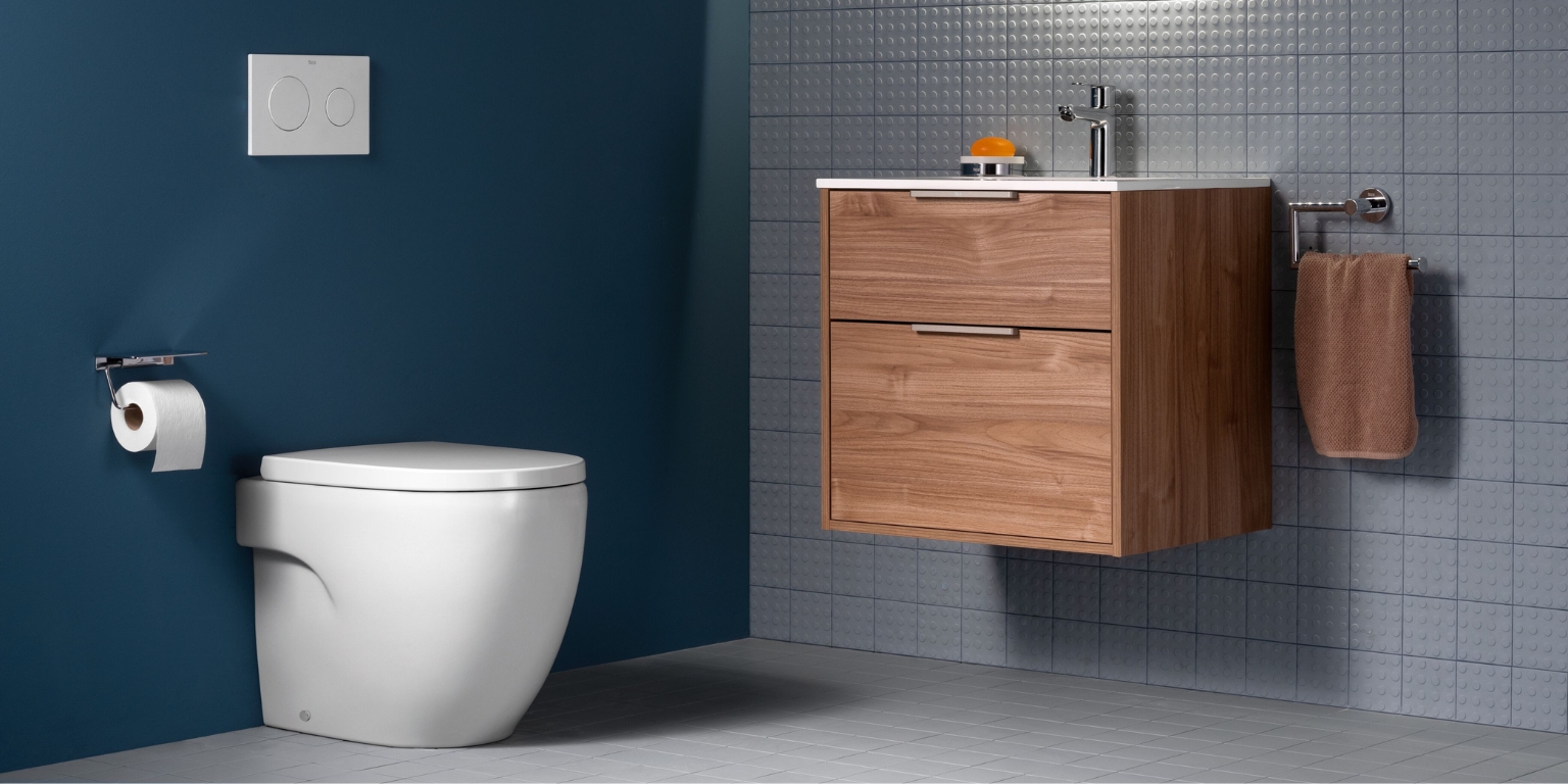 Lifestyle image of a back to wall toilet near a wall-hung vanity unit