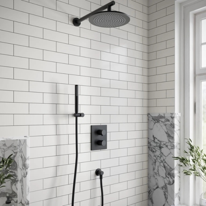 lifestyle image of Villeroy & Boch Matt Black Round Complete Shower Set