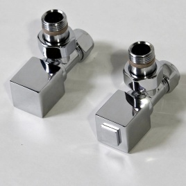 image of the sussex range by JIS solar square angled chrome radiator valves lying on table