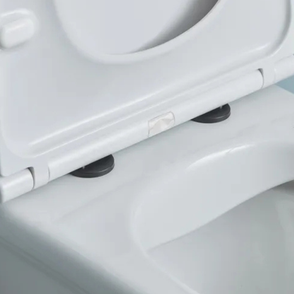 Lifestyle image of the Tavistock Black Wrap Over Toilet Seat Hinge Cover Caps