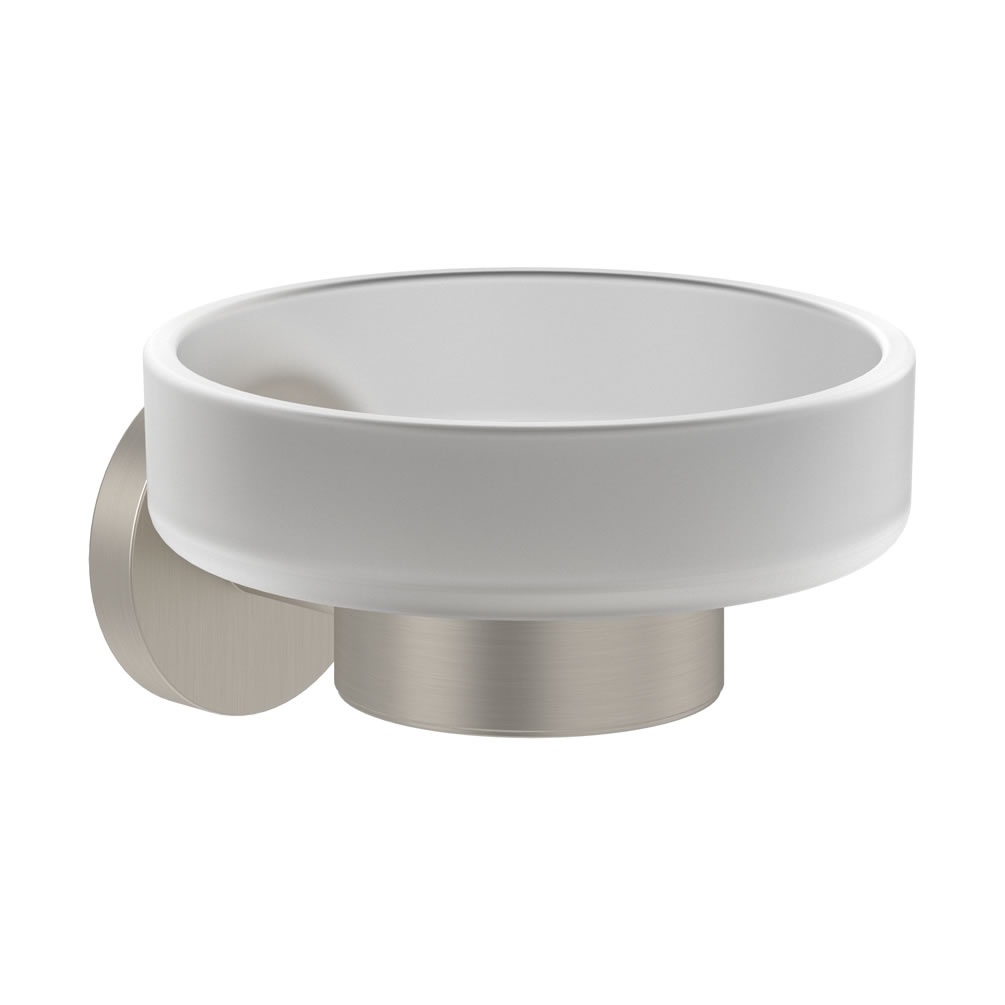 Cutout image of With its sleek, relaxing curves and ultra-contemporary finish, this wall-mounted soap dish is a fetching partner for your modern bathroom basin. This Villeroy & Boch accessory includes an icy frosted glass dish with a stark and striking br