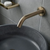 Lifestyle image of Vado Individual Brushed Gold Wall-Mounted Basin Sensor Spout