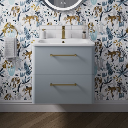 Product lifestyle image of Britton Bathrooms Camberwell Dusty Blue Wall Hung Vanity Unit with Basin in Bathroom with brass handles and tap front shot