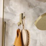 Lifestyle image of Crosswater Fold Brushed Brass Double Shower Hook