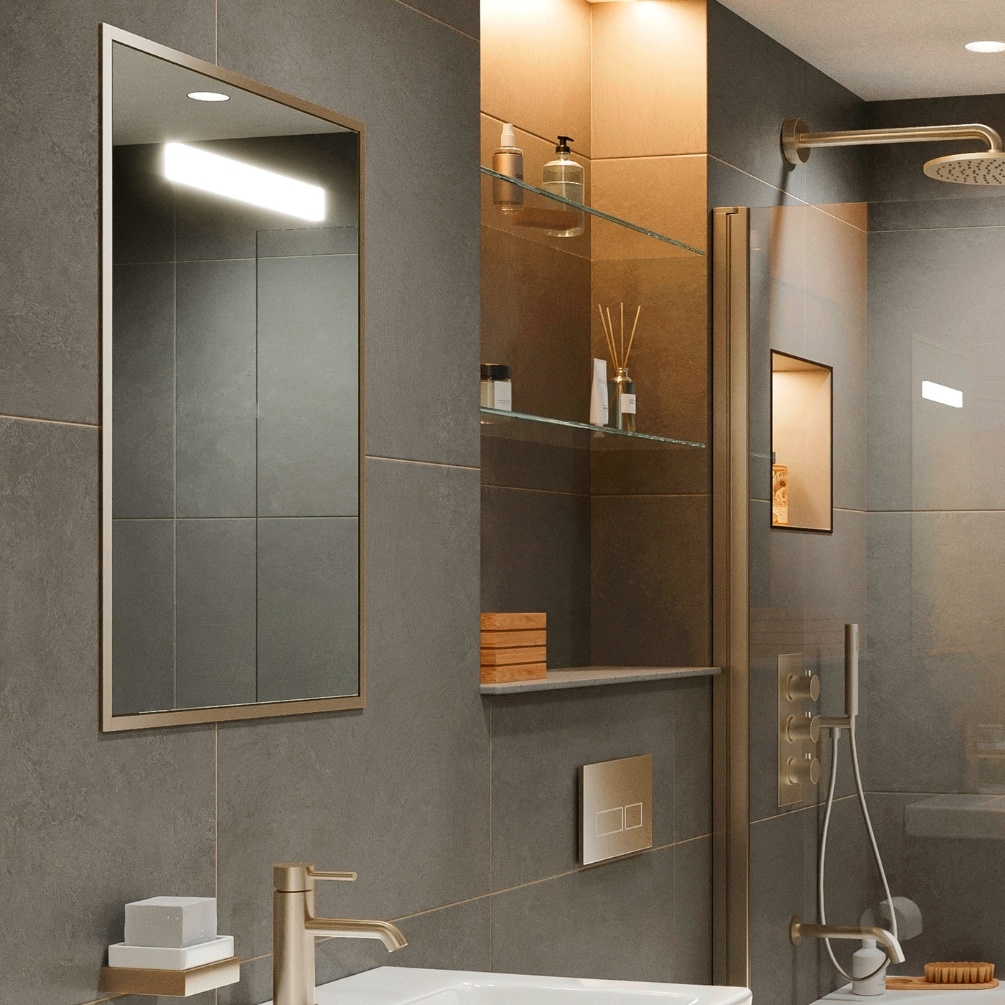Lifestyle image of the Abacus Aluminium Trio Brushed Brass Recessed LED Mirror Cabinet mounted on a dark grey bathroom wall, in-front of a basin with brushed brass tap.