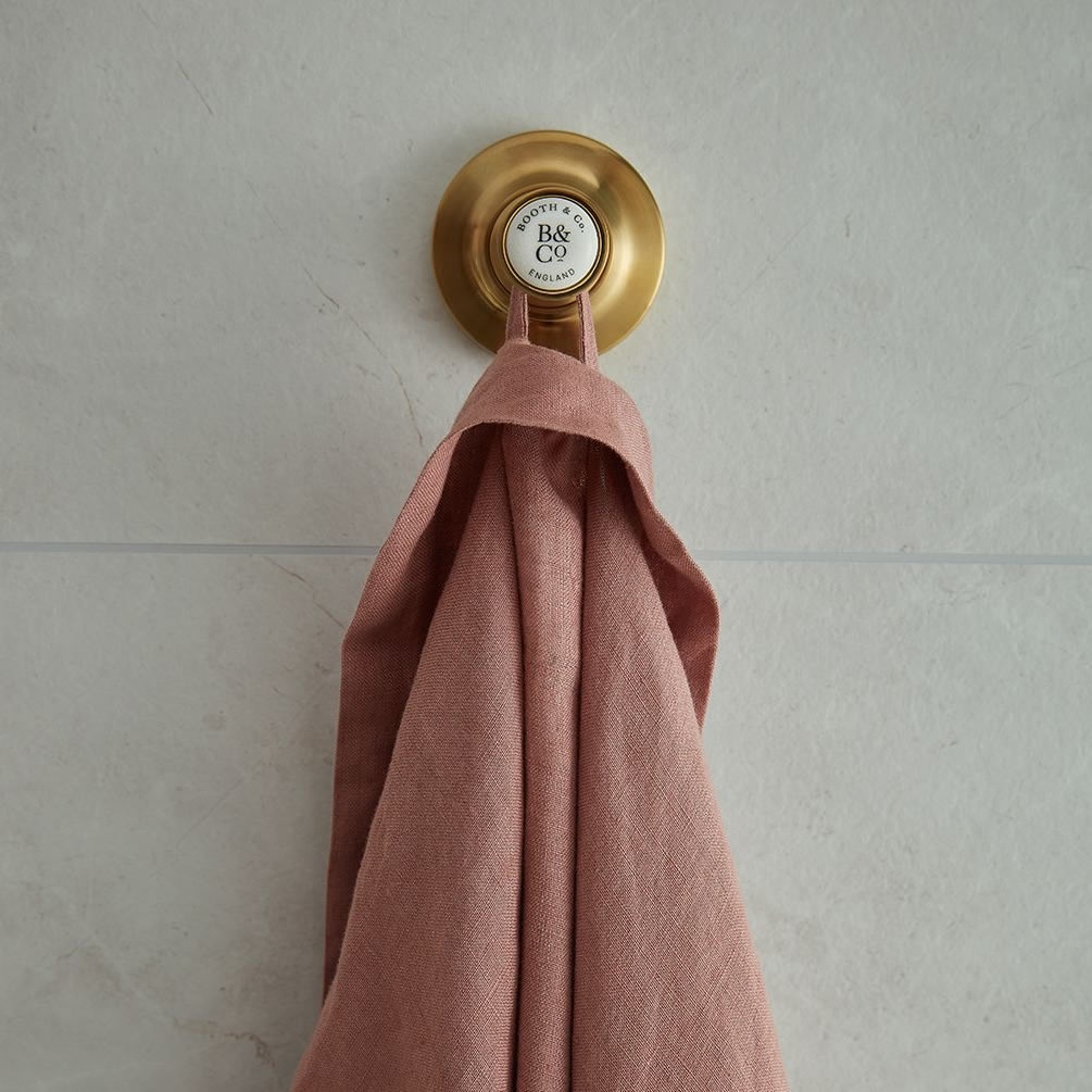 Booth & Co. Axbridge Brushed Brass/White Robe Hook - Lifestyle Image 1