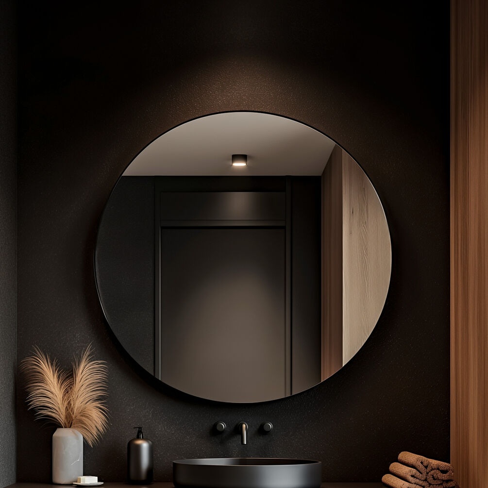 Lifestyle image of Origins Living Oslo Black 1000mm Round Mirror