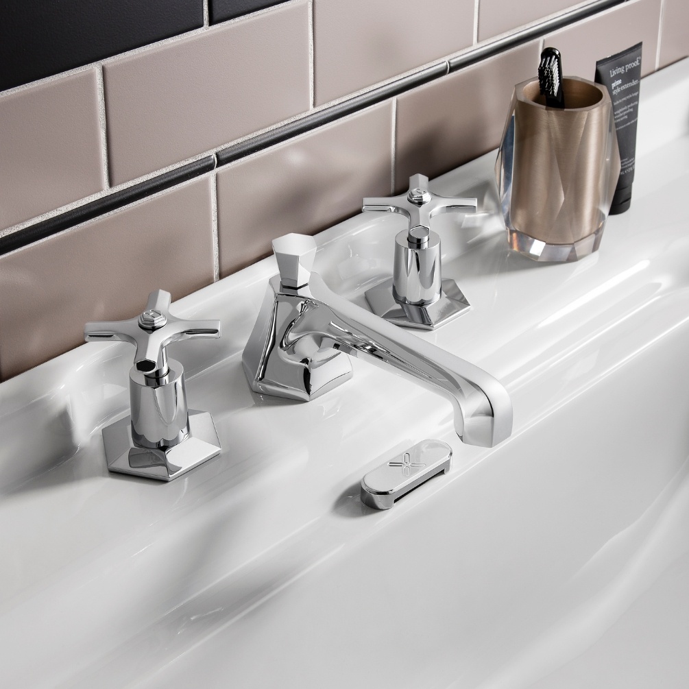 Lifestyle image of the Crosswater Waldorf Chrome 3 Tap Hole Crosshead Deck Mounted Basin Mixer mounted on the deck of a white traditional basin
