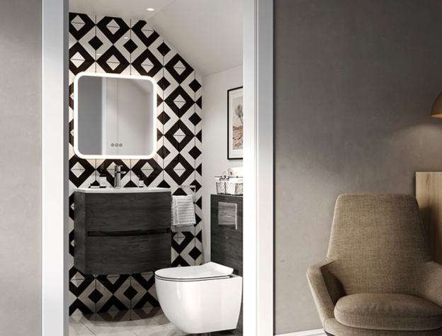 Product Lifestyle image of the Crosswater Abstract Suite, featuring a wall mounted toilet, black and white wall tiles, a wall hung washbasin unit and a LED mirror