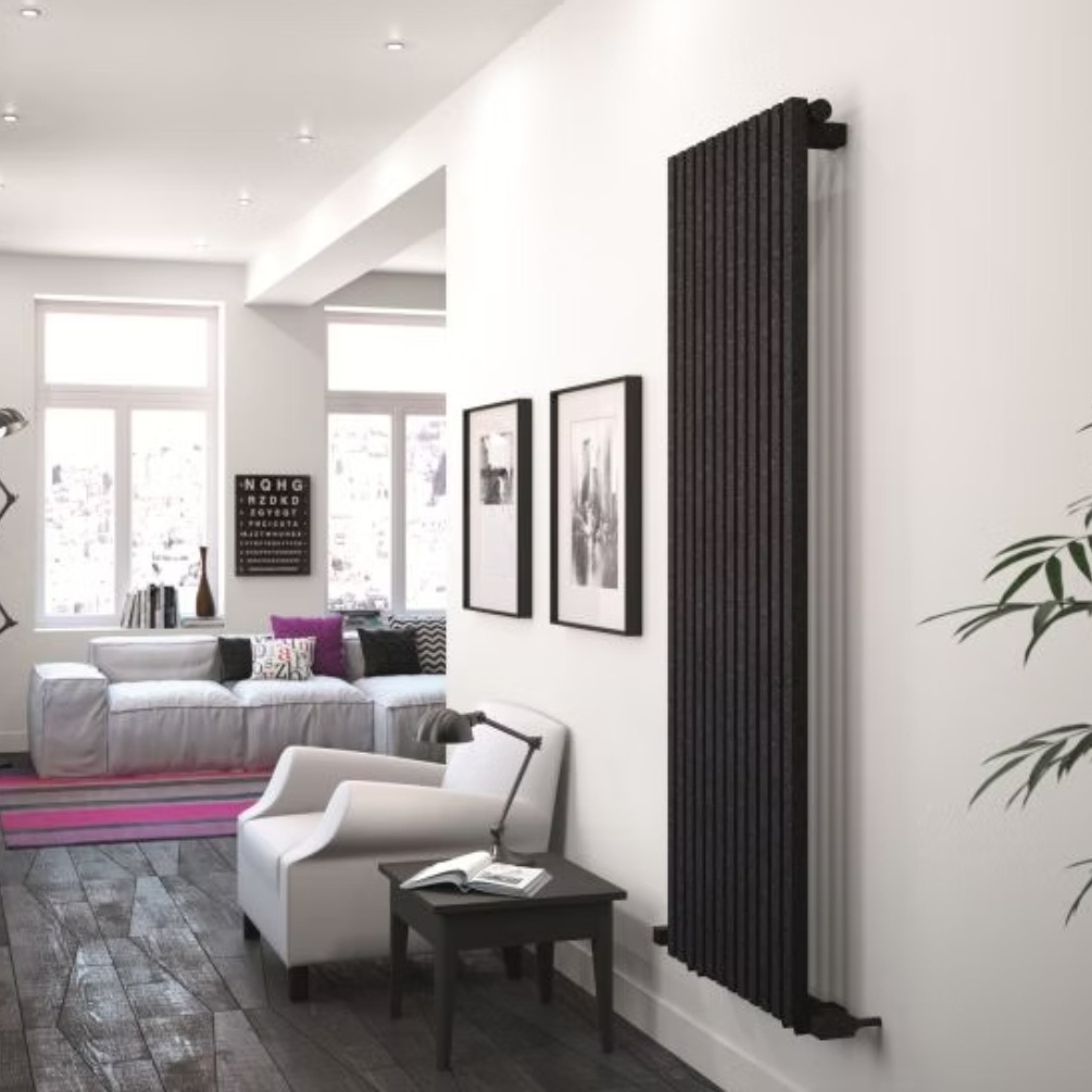Lifestyle image of the Radox Vertica D 1800mm x 535mm Black Pearl Vertical Radiator mounted on a wall