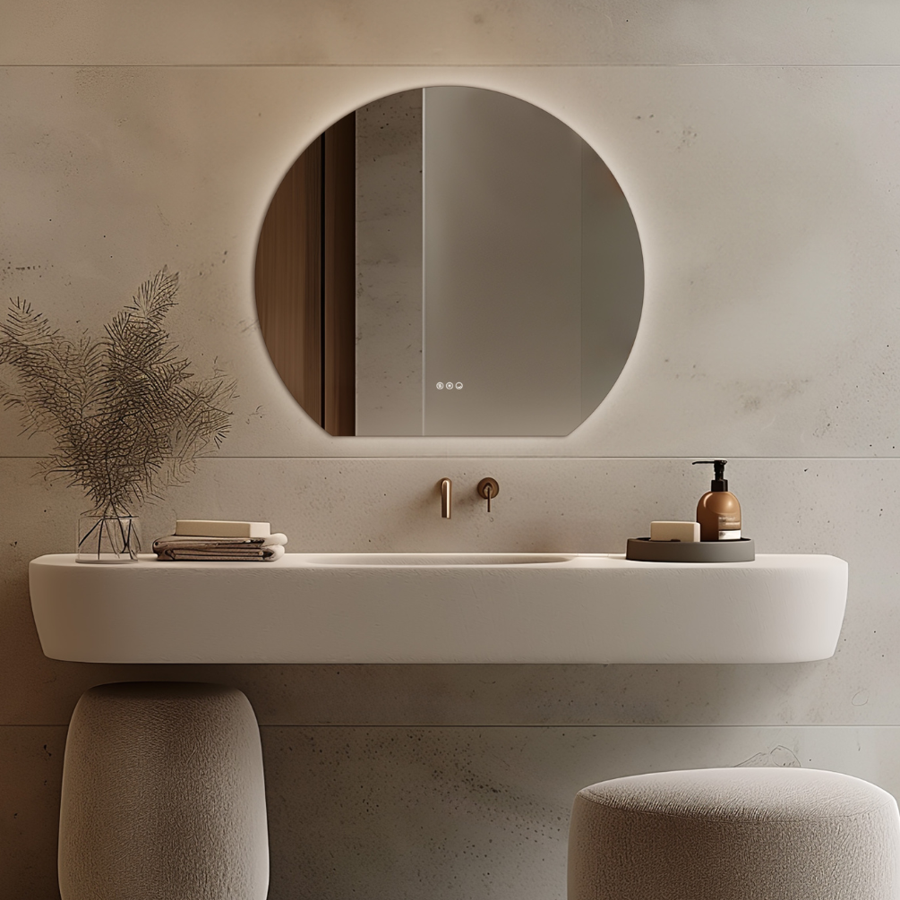 Product Lifestyle Photo of Origins Living Claris Round Cut 1000mm x 900mm Mirror hanging on a wall in front of a sink