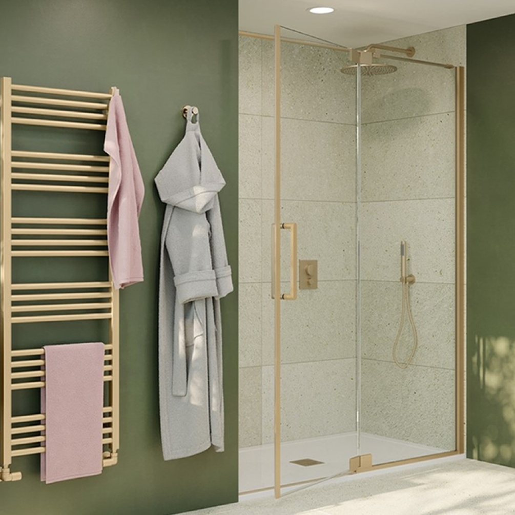 Lifestyle photo of Crosswater Optix 10 Brushed Brass Pivot Shower Door with Inline Panel