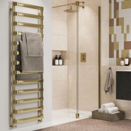 image of crosswater towel rail radiator with green towel hanging