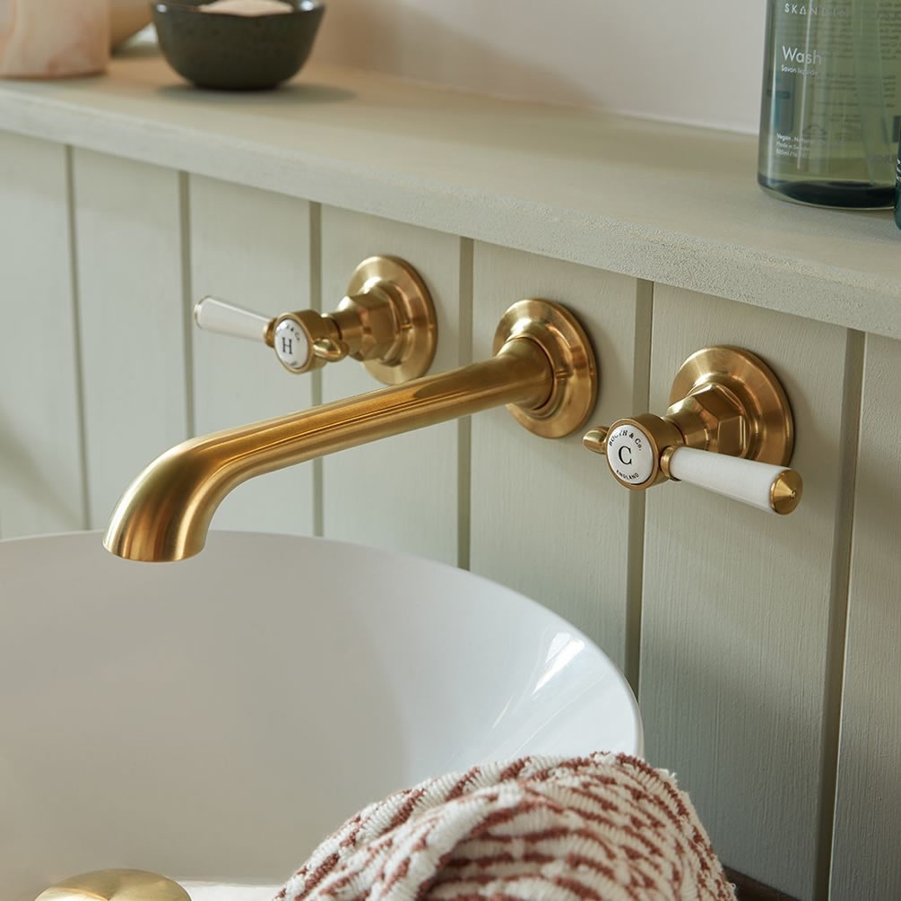 Booth & Co. Axbridge White Lever Brushed Brass Wall Mounted Basin Mixer - Lifestyle Image 1