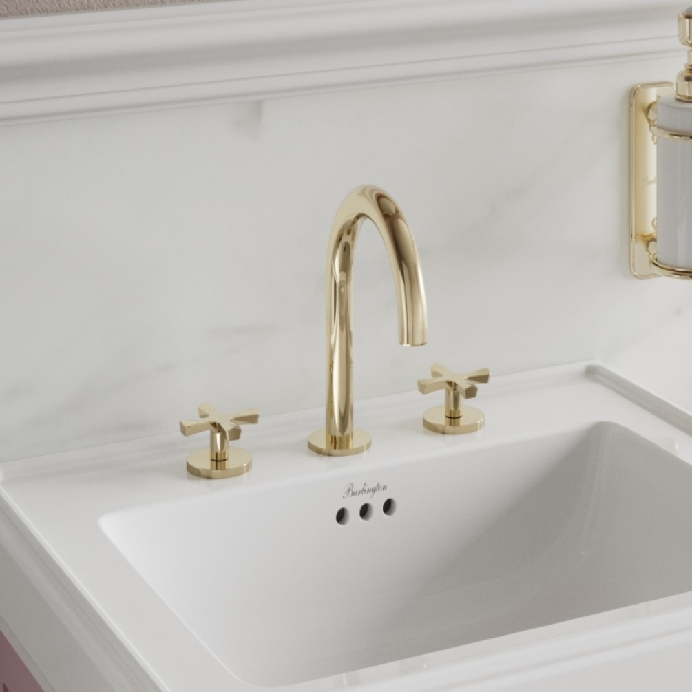 Product Lifestyle image of the Burlington Riviera Gold 3 Hole Deck Basin Mixer mounted atop the Riviera Basin & Matt Pink Vanity Unit