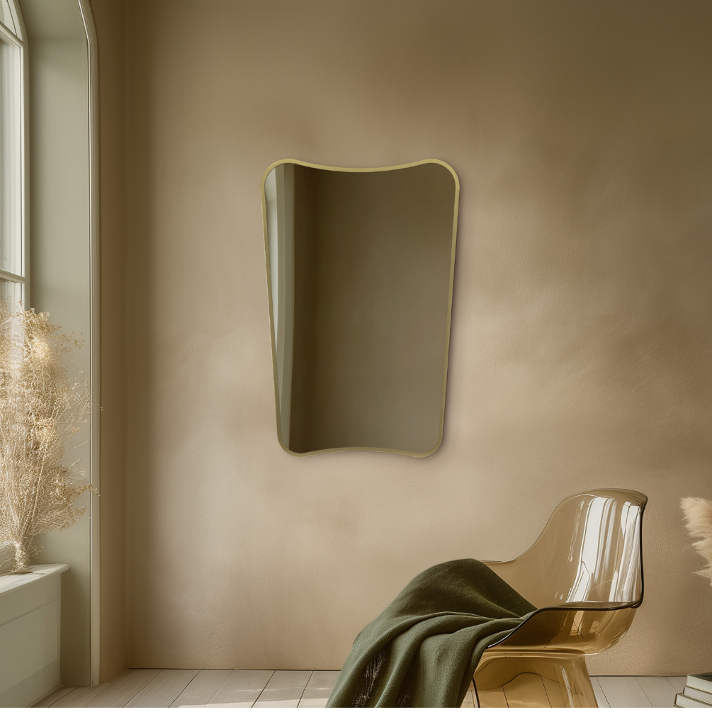 Lifestyle image of Origins Living Delphine Curve 600 Brushed Brass Mirror