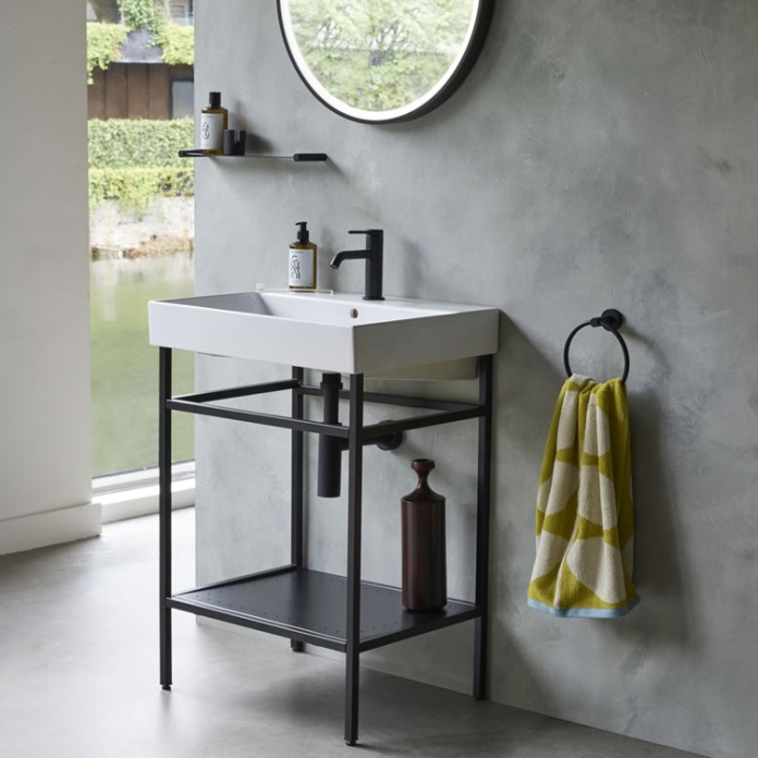 Photo of the Shoreditch Frame Furniture Stand in Matt Black with cement-effect wall