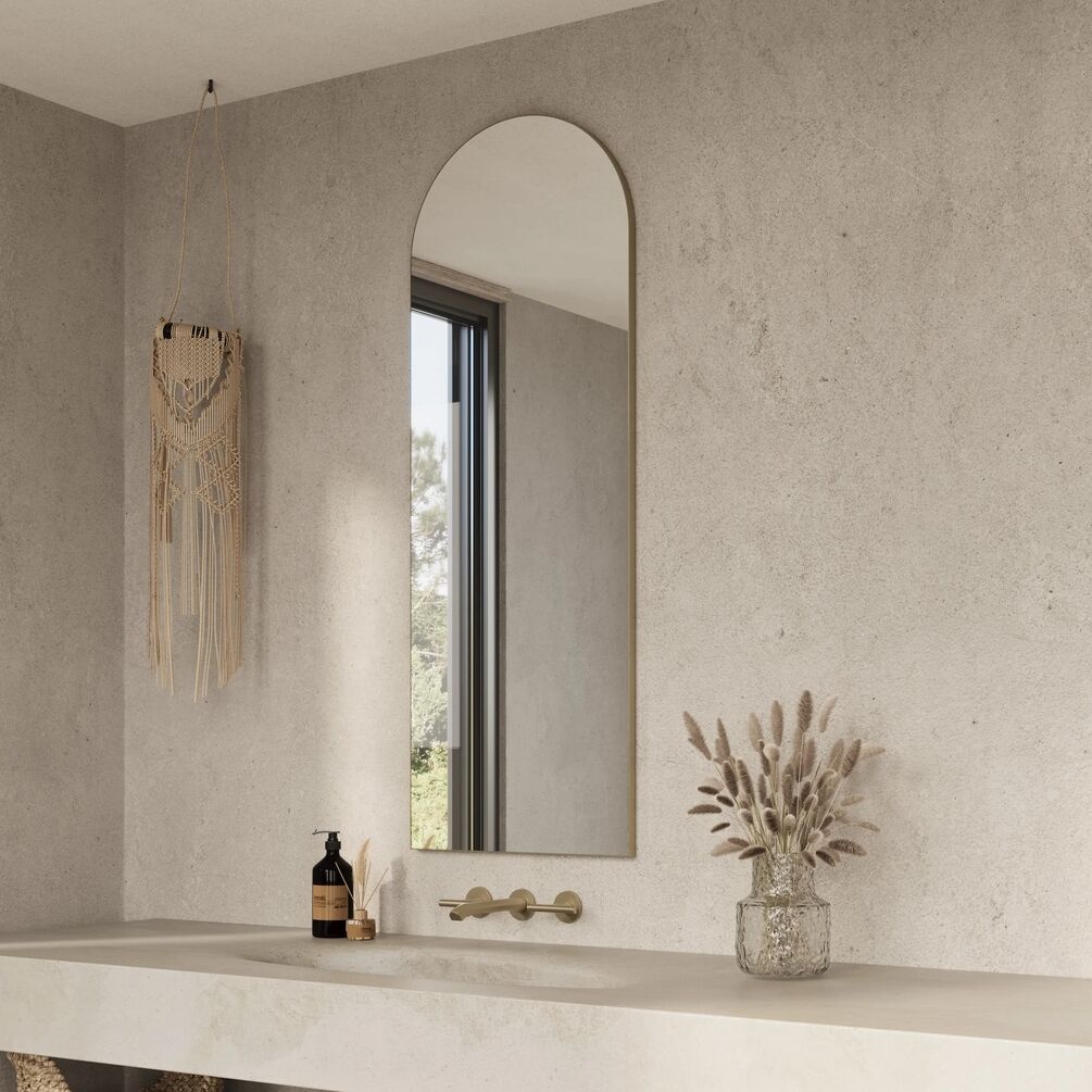 Lifestyle image of Origins Living Oslo Arched Brushed Brass 500 x 1400mm Mirror