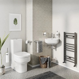 image of crosswater kai s close coupled toilet in bathroom suite with compact corner basin and small towel rail